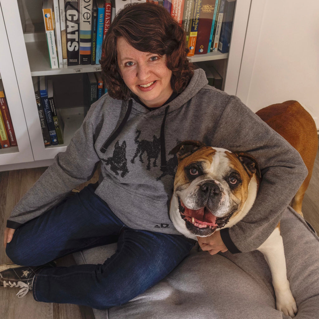 Woman with a dog wearing a Best Friends Animal Society Scribble Hoodie