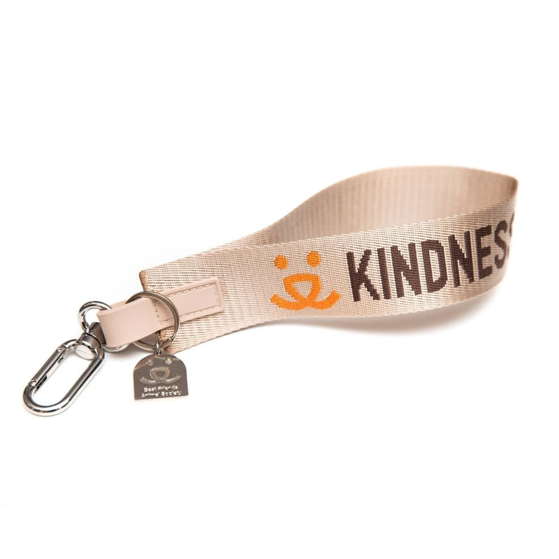 Person in BFAS Kindness tank top with dog