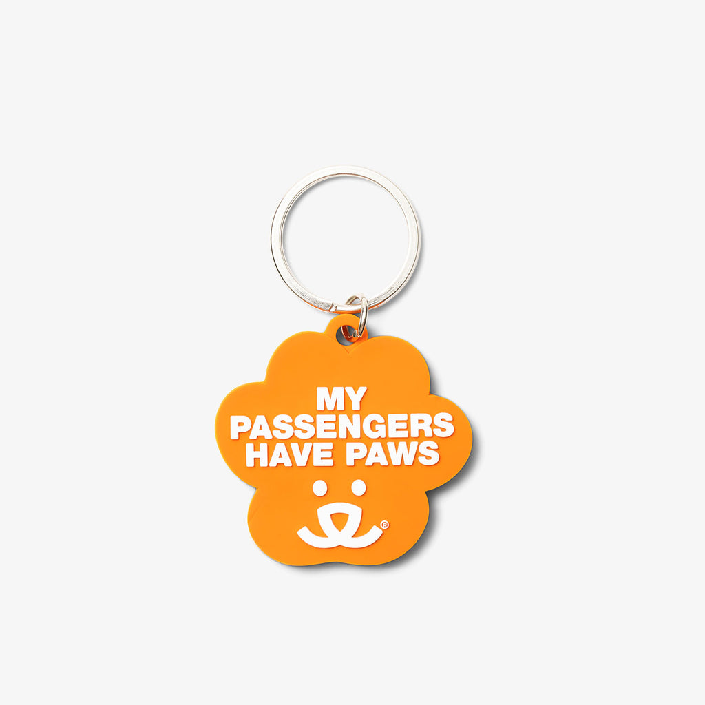 Orange keychain with words My Passengers Have Paws and Best Friends Logo