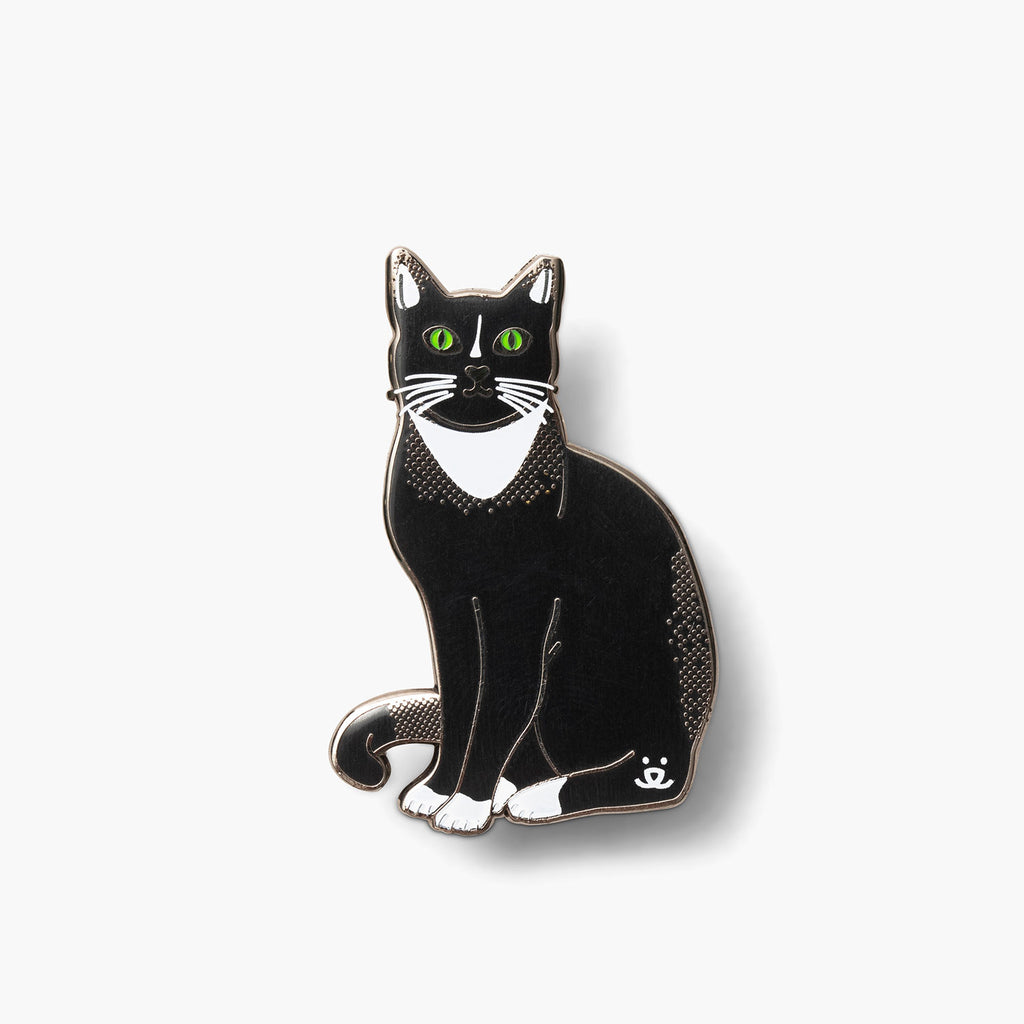 Tuxedo black and white cat with green eye pin